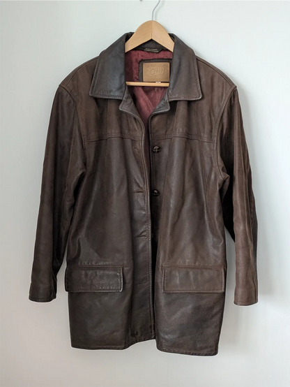 Brown leather jacket on a hanger against a white background